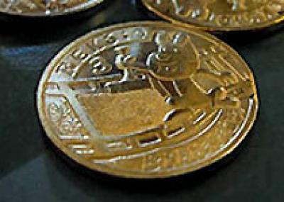 Монеты с псом Рексом выпущены в Польше