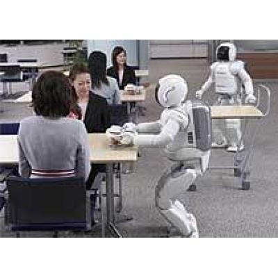 ASIMO научился `жить` и работать в обществе