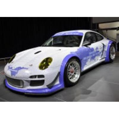 Porsche показал гибридный спорткар 911